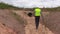 Engineers shaking hands at the drainage ditch