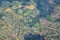 England rural landscape, fields, meadows and clouds. Aerial view from airplane of endless lush pastures and farmlands. Beautiful E