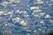 England rural landscape, fields, meadows and clouds. Aerial view from airplane of endless lush pastures and farmlands. Beautiful E