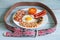 English breakfast diet abstract concept with food and belt