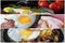 English Breakfast of scrambled eggs with various additives. Collage of three photos