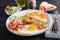 English breakfast - toast, egg, bacon and tomatoes and microgreens salad