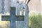 English country cemetary with ancient stone cross headstone in r