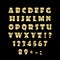 English golden alphabet on a black background