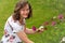 English lady cutting Cosmos flowers, in July, 2021.