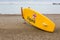 English lifeguard yellow board on beach