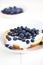 English muffin with cream and blueberries, breakfast