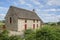 English stone cottage with a thatch roof