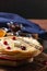 English-style pancakes with berries, traditional for Shrove Tuesday. Traditional classic thin golden flapjack on the plate and