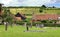 An English Summer Landscape with a Village in the Valley