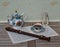 English teacup with saucer and teapot, fine bone china porcelain, metronome for music and a block flute on a sheet of music