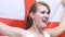 English Young Woman Celebrates holding the Flag of England in Slow Motion