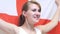 English Young Woman Celebrates holding the Flag of England in Slow Motion