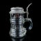 Engraved antique glass mug. vintage mug with a metal lid