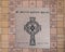 Engraved stone and bricks in the front of the historic Saint Patrick Catholic Parish Church in Denison, Texas.