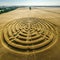 Enigmatic Patterns from Above: Aerial View of Intricate Crop Circle in Wheat Field