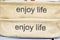 Enjoy Life- text in sack cloth letter press
