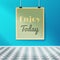 Enjoy Today Motivating Poster on the Wall in the Room with Tiled Floor