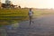 Enjoying her sunset running session. A young woman exercising outdoors at sunset.