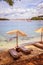 Enjoying the holiday: Sunshade and lounge on a beach, Croatia