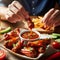 Enjoying Spicy Chicken Wings With Dipping Sauce at a Casual Evening Gathering