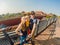 Enjoying vacation in China. Happy family with national chinese flag in Forbidden City. Travel to China with kids concept