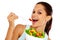 She enjoys healthy meals. Portrait of an attractive young woman enjoying a healthy salad.