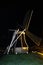 Enkhuizen, Netherlands. October 2022. The illuminated windmill near Enkhuizen.