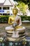 Enlightened Buddha with golden ushnisha holding a bowl in Lotus