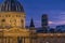 Enlightened Monuments at Dusk in Paris With Montparnass Tower Above Rooftops