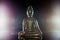 Enlightenment. Traditional buddha figurine in meditation pose.