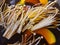 Enoki Mushrooms and Sliced Pumpkins in Black Shabu Soup
