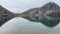 Enol Lake panoramic view with fog. Picos de Europa National Park. Asturias.