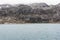 Enormous rocks, small house, Greenland