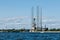 Ensco 101 floating drilling rig,drilling cranes,vessels and mining platforms in Kronstadt on Navy Day.Kronstadt Marine
