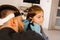 ENT doctor with otoscope. Otoscopy. Pediatrician otolaryngologist looks through otoscope the ears of child. Otoscopy