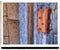 Enter hang a hard leftâ–ª orange doorhenge gray and copper colored work area auto shop