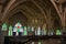 Enterior with arches, crosses and stained glass window inside Catholics church in Abuja, church is known as The National Christian