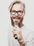 The entertainer. Young talking man holding microphone, Isolated on white background.