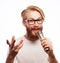 The entertainer. Young talking man holding microphone, Isolated on white background.