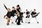 Entertaining concept, teamwork. International group of musicians on a white background, guitarist, drummer, soloists