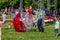 Entertainment of zorbing in the park. Children rolling downhill inside an orb sphere. Enjoy of childhood.