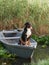 An enthralling Entlebucher Mountain Dog enjoys a serene moment aboard a boat