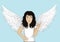 Enthusiastic girl angel with beautiful wings smiling and showing