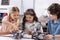 Enthusiastic kids enjoying discussion at school