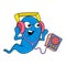 Enthusiastic looking monster is listening to the music player from headphones, doodle icon image kawaii