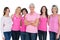 Enthusiastic women posing with pink tops for breast cancer