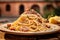 Enticing image of Spaghetti Carbonara on an antique table, with the silhouette of the Colosseum under a blue Roman sky.
