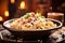 Enticing image of Spaghetti Carbonara on an antique table, with the silhouette of the Colosseum under a blue Roman sky.