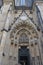 entrance arch, intricate stucco molding, catholic church